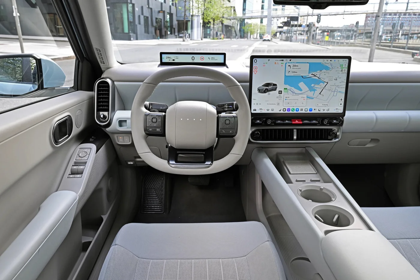 Hyundai Ioniq 3 dashboard with the large central touchscreen and slim driver display