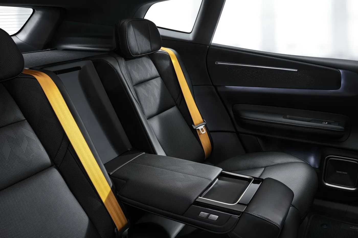 Polestar 4 SUV rear seats with gold seatbelts