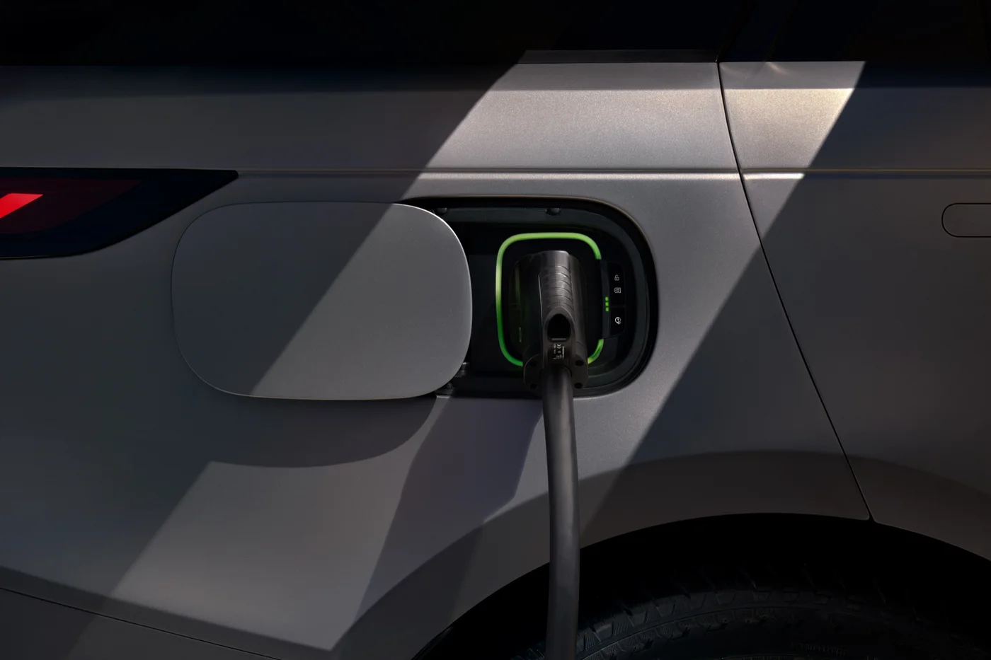 Range Rover Sport Electric plugged in at its charging port